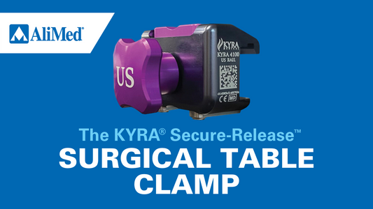 clinician placing secure release clamp on operating room side rail