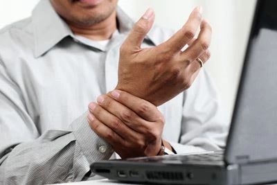 man holding his wrist
