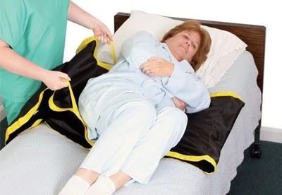 nurse using no lift turner on patient