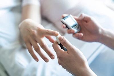 nurse taking patients blood pressure
