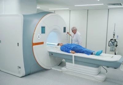 doctor putting patient in mri scan