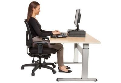 woman sitting at desk 