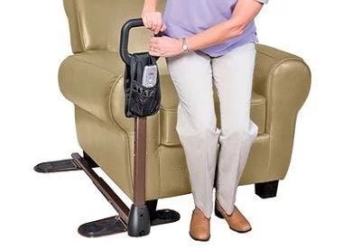 patient using couch cane to get out of chair