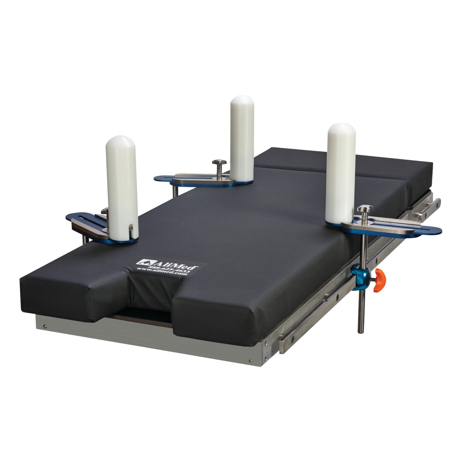 An image of three foam covered posts mounted on a surgical table representing a category of lateral positioning