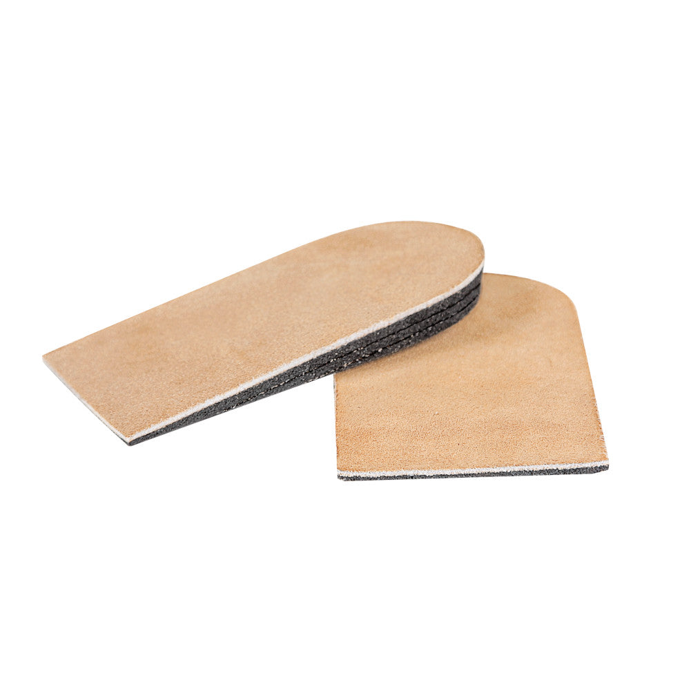 A pair of beige leather heel lifts representative of a heel cups and lifts category