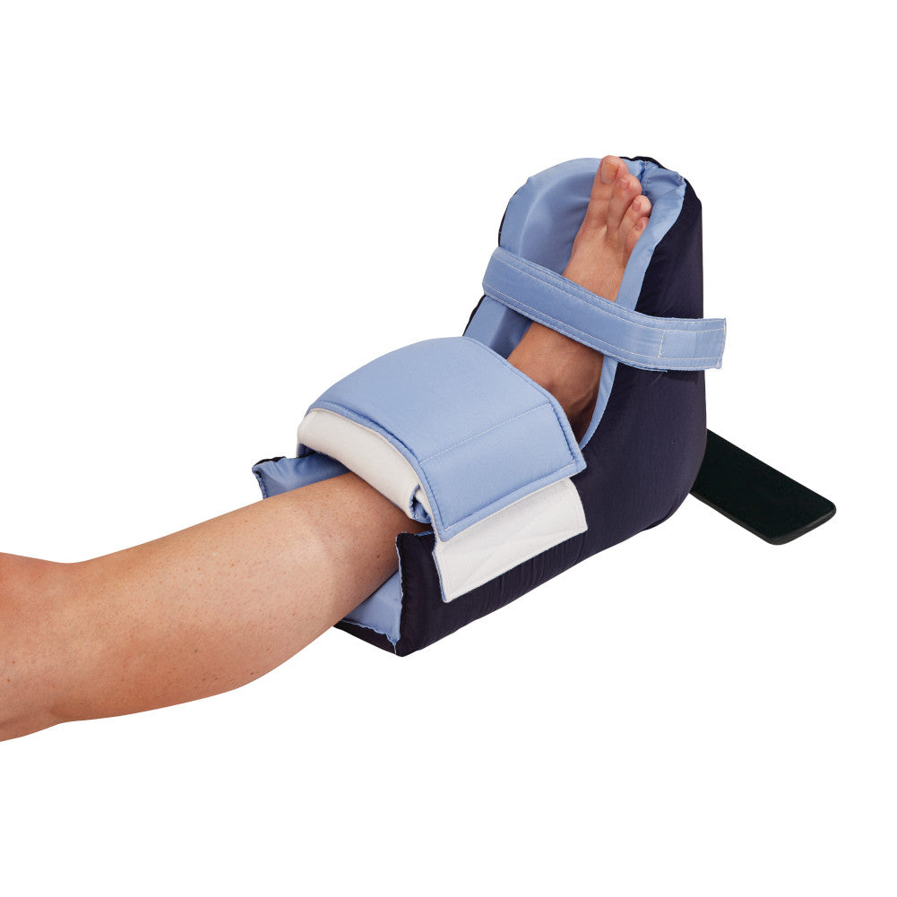 A blue soft, padded heel protection boot and footdrop prevention boot on a woman's leg representing skin and heel protection product category