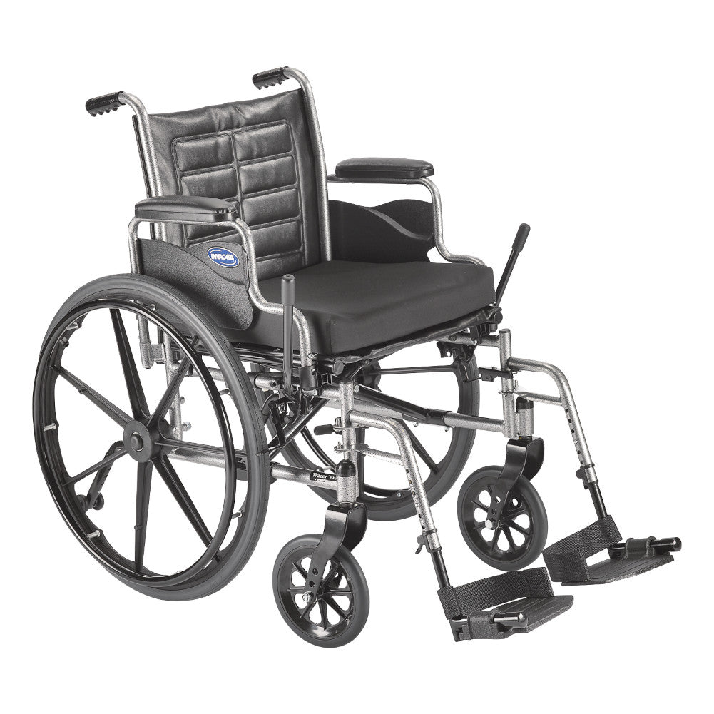 A black upholstered traditional wheelchair representing a standard wheelchair category