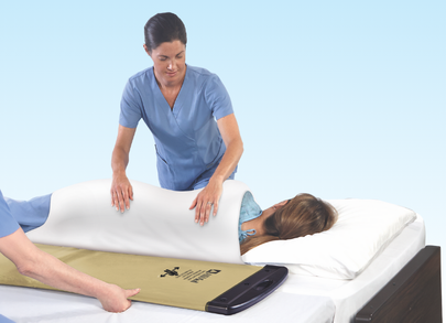 nurses transferring patient with rollboard
