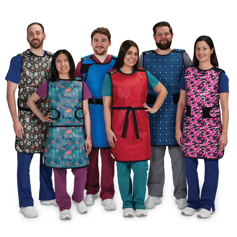 group of people wearing radiation aprons