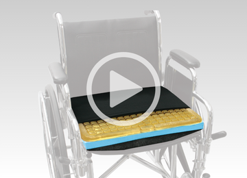 wheelchair cushion on wheelchair with video icon